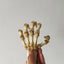 3D printed, hand-painted, and aged skeleton hand for Halloween.