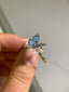 Little butterfly on flower-ring