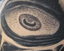 Black eye corners, orange-red veins, and yellow sclera — eye bracelet.