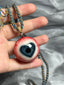 Wind-Eye Pendant.