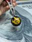 Goat pupil – with the Frenzied Flame mark from Elden Ring on the back
