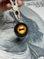 Goat pupil – with the Frenzied Flame mark from Elden Ring on the back